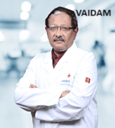 Dr. Alok Mazumdar