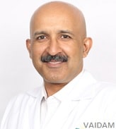 Dr. Havind Tandon