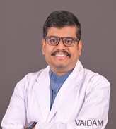 Dr. Kiran S
