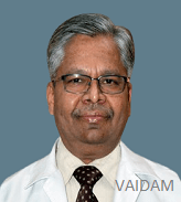 Dr. Sadanand Karandikarq